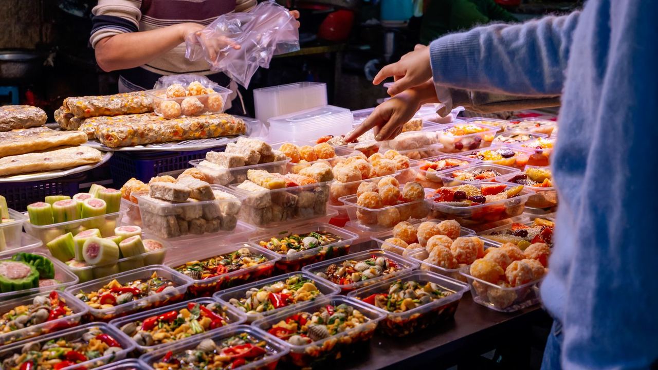 Vibrant Chinese street food market at night