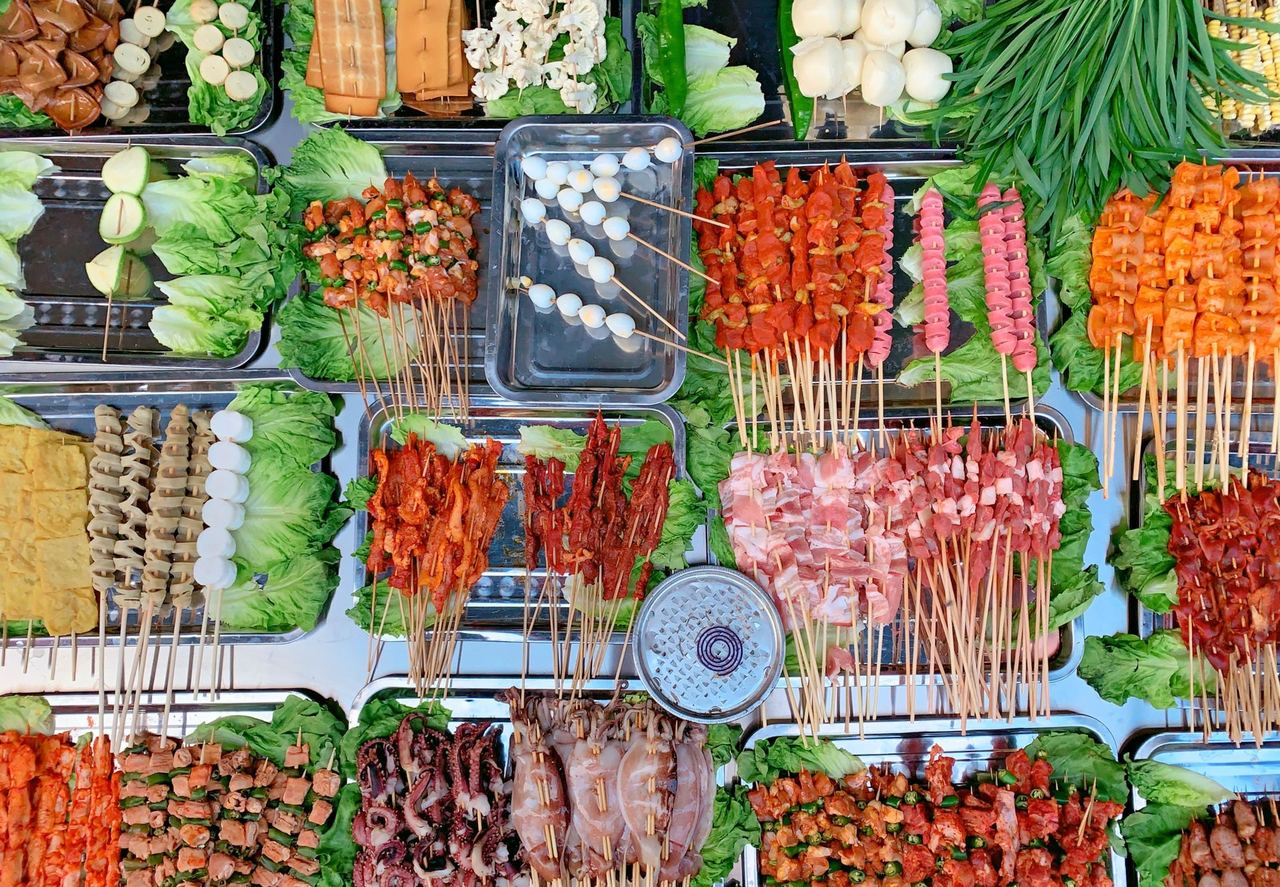 Skewers at a Chengdu street market, hotpot’s casual cousin