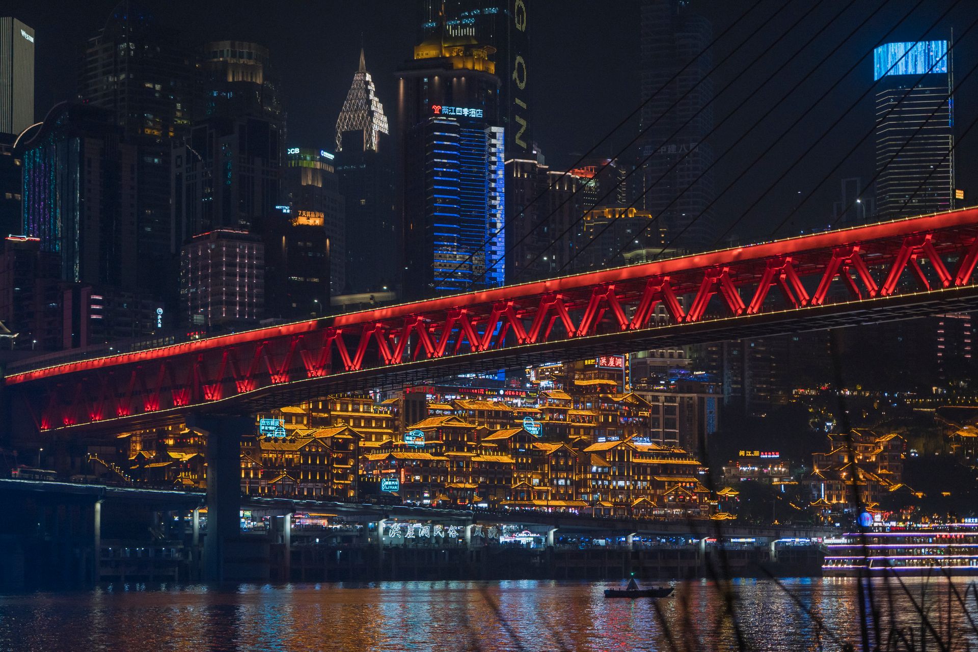 Qiansimen Bridge and Hongyadong’s lights, seen from across the Jialing