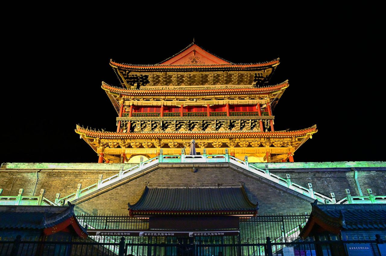 The Bell Tower lit up at night, at the heart of Xi’an